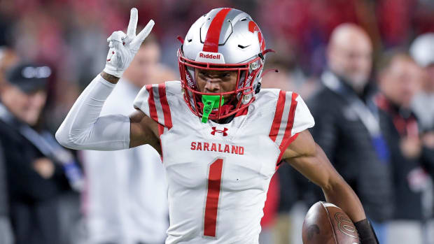 Saraland's Ryan Williams (1) scores his second touchdown of the night against Clay-Chalkville during the AHSAA Class 6A football state championship game at Bryant Denny Stadium in Tuscaloosa, Ala., on Friday December 8, 2023. 